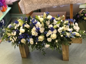 Blue and white coffin spray