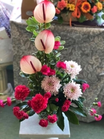Pink Anthurium and Carnation arrangement